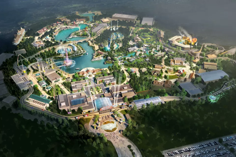 An aerial rendering of a sprawling and extravagant theme park.
